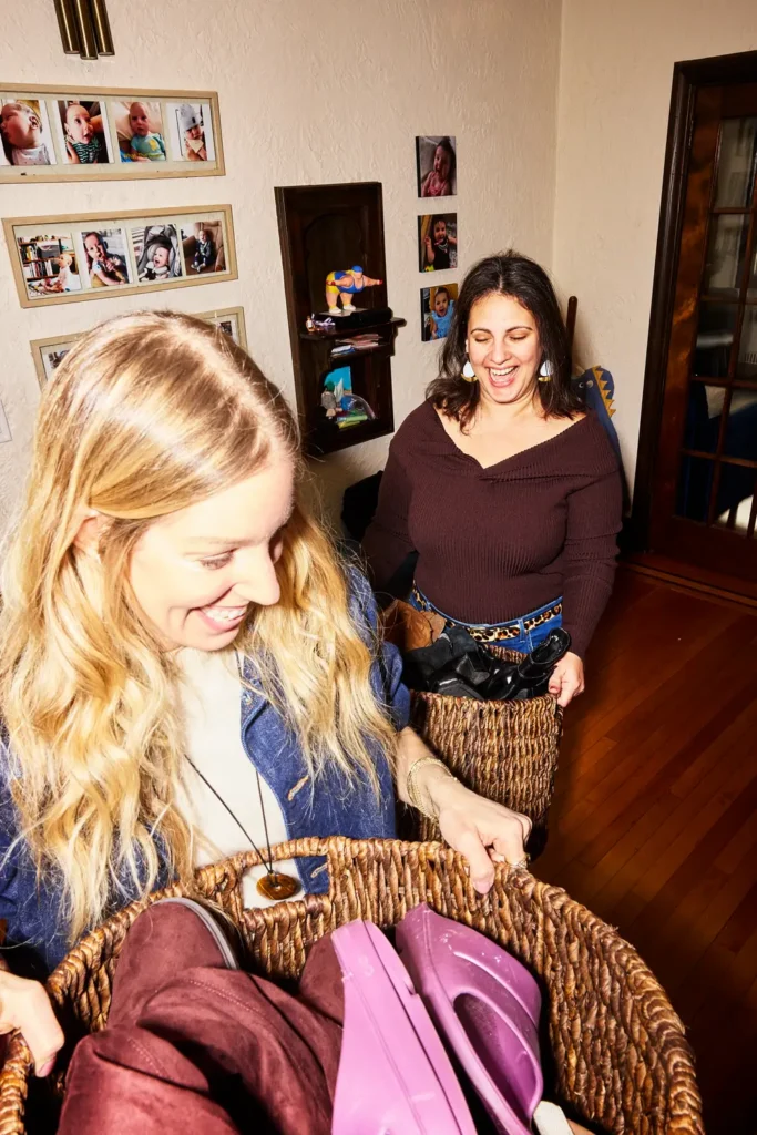 Fashion stylist selecting accessories during a wardrobe edit