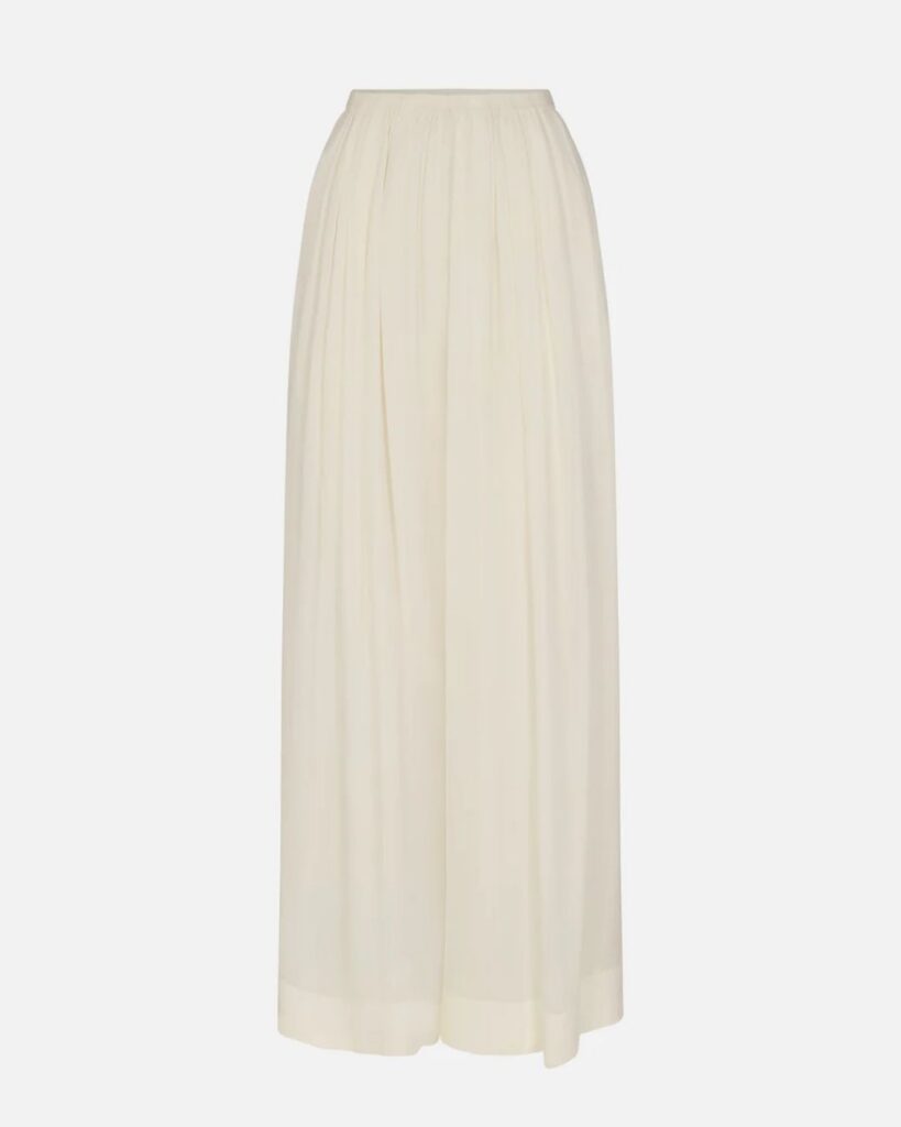 Ivory pleated maxi skirt for a timeless capsule wardrobe