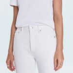 White T-shirt styled with high-rise white jeans