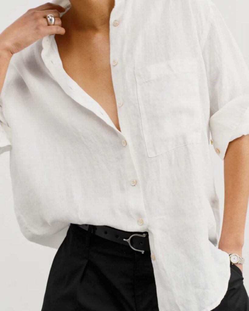 White linen button-down styled with black trousers