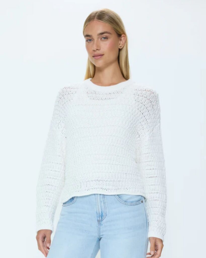 White open-knit sweater for a light capsule wardrobe